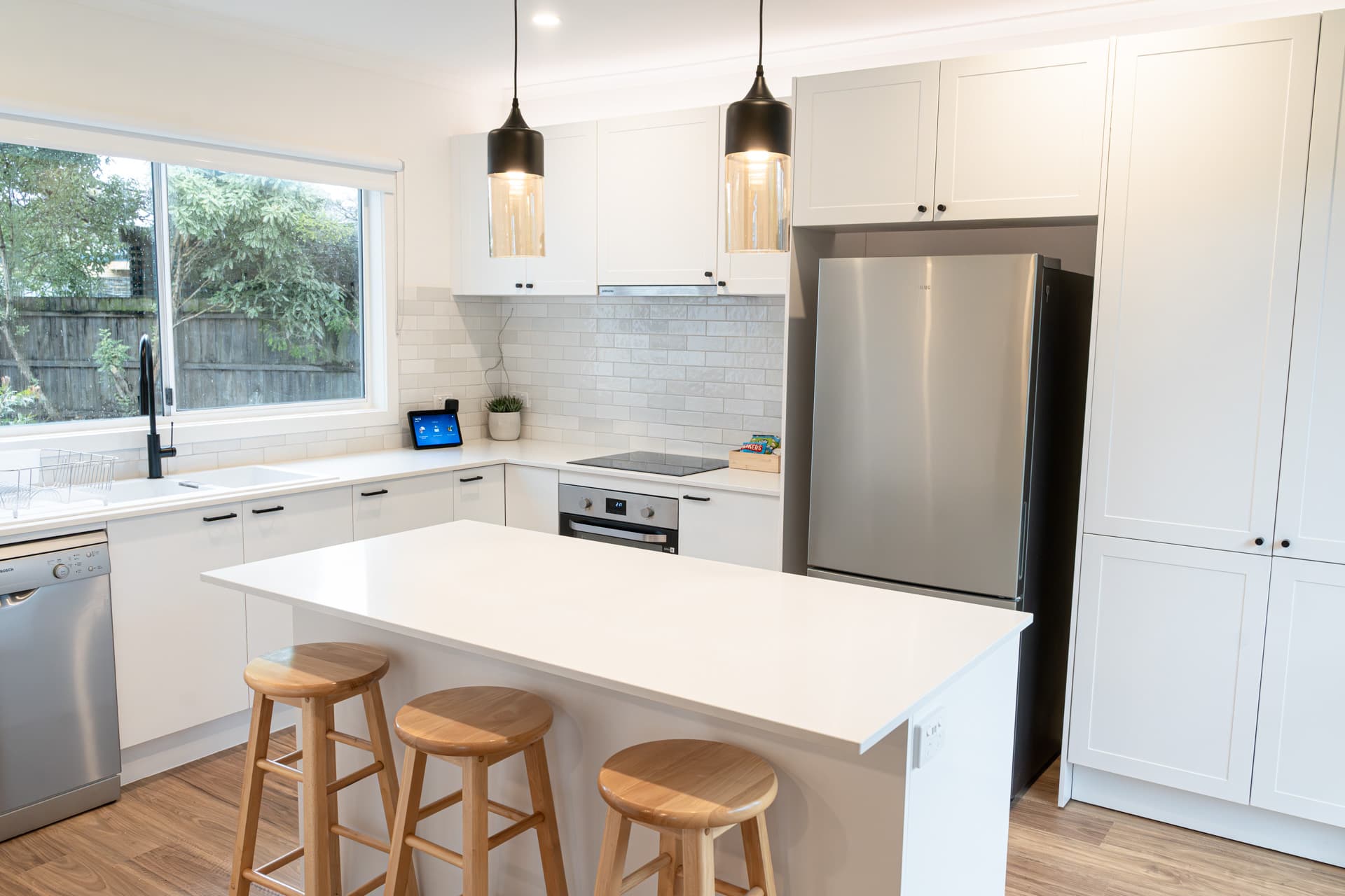 Fully equipped modern kitchen with coffee machine at Big Isle Retreat