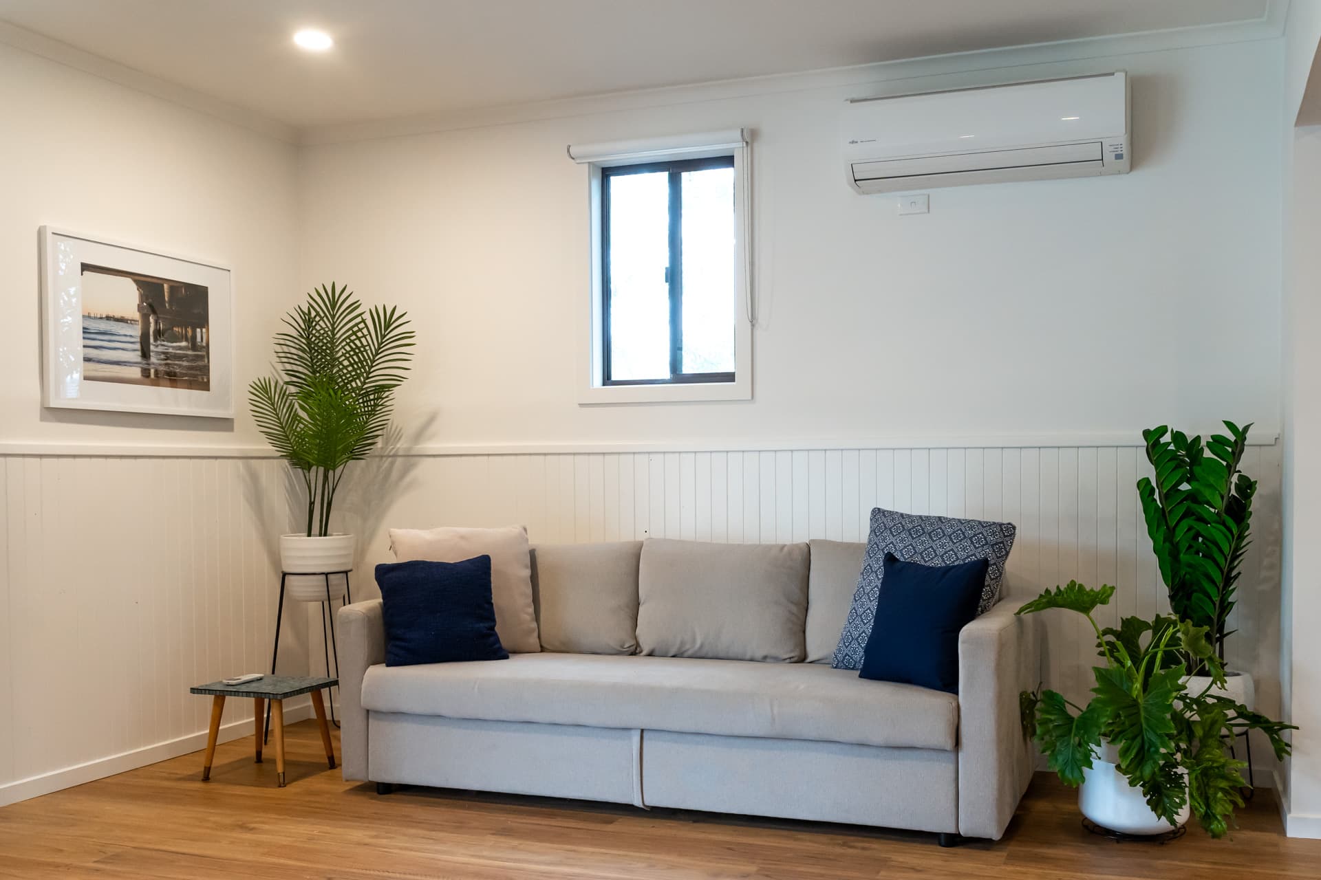 Sofa bed in entertainment room at Big Isle Retreat