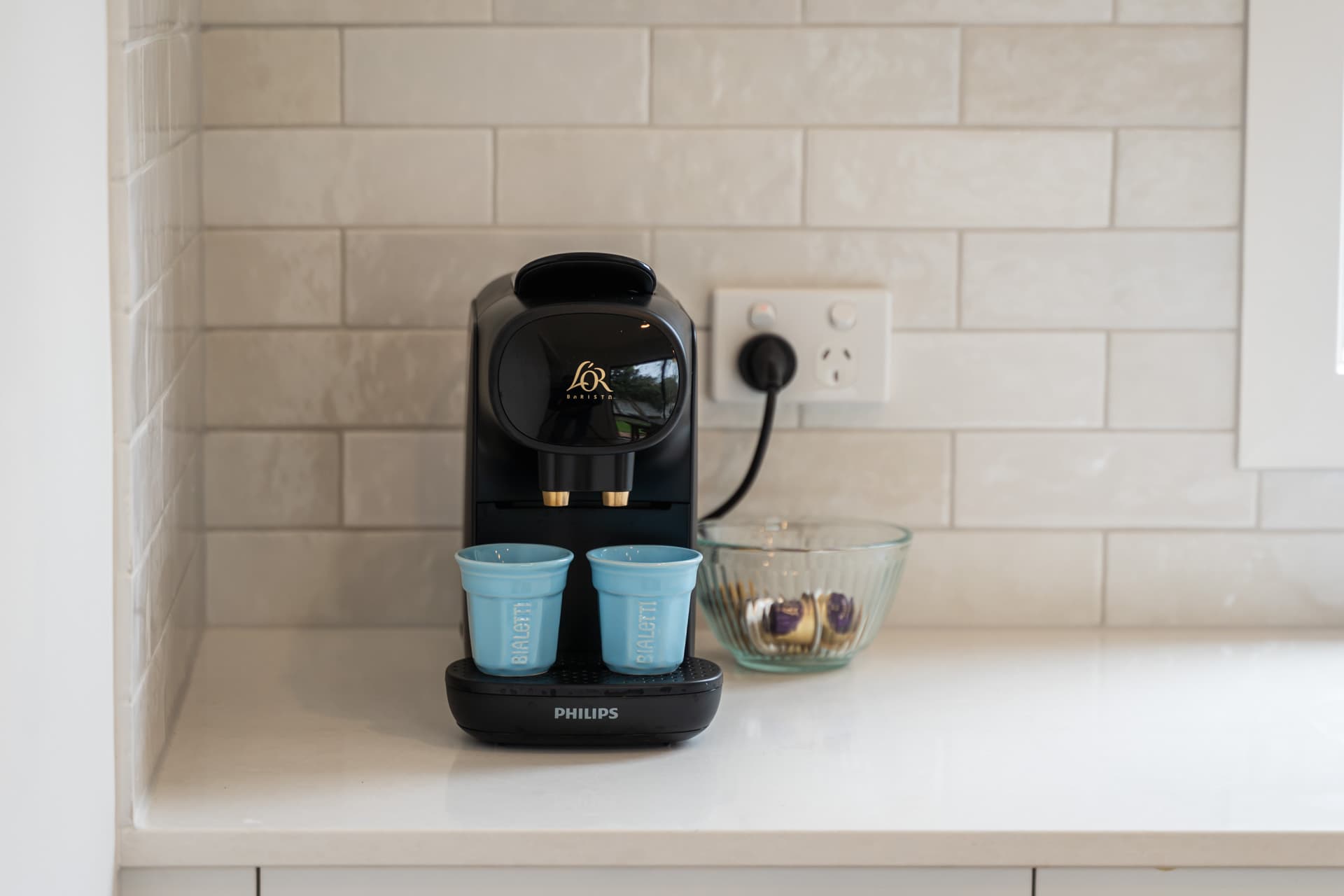 Coffee pod machine in kitchen at Big Isle Retreat