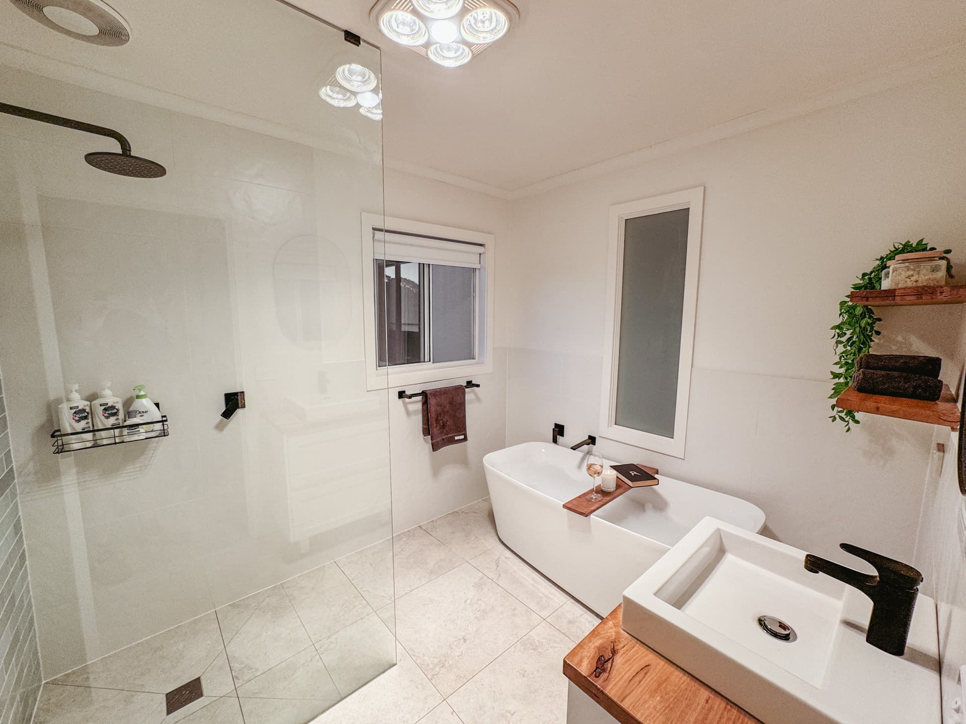 Upstairs bathroom with freestanding bathtub at Big Isle Retreat